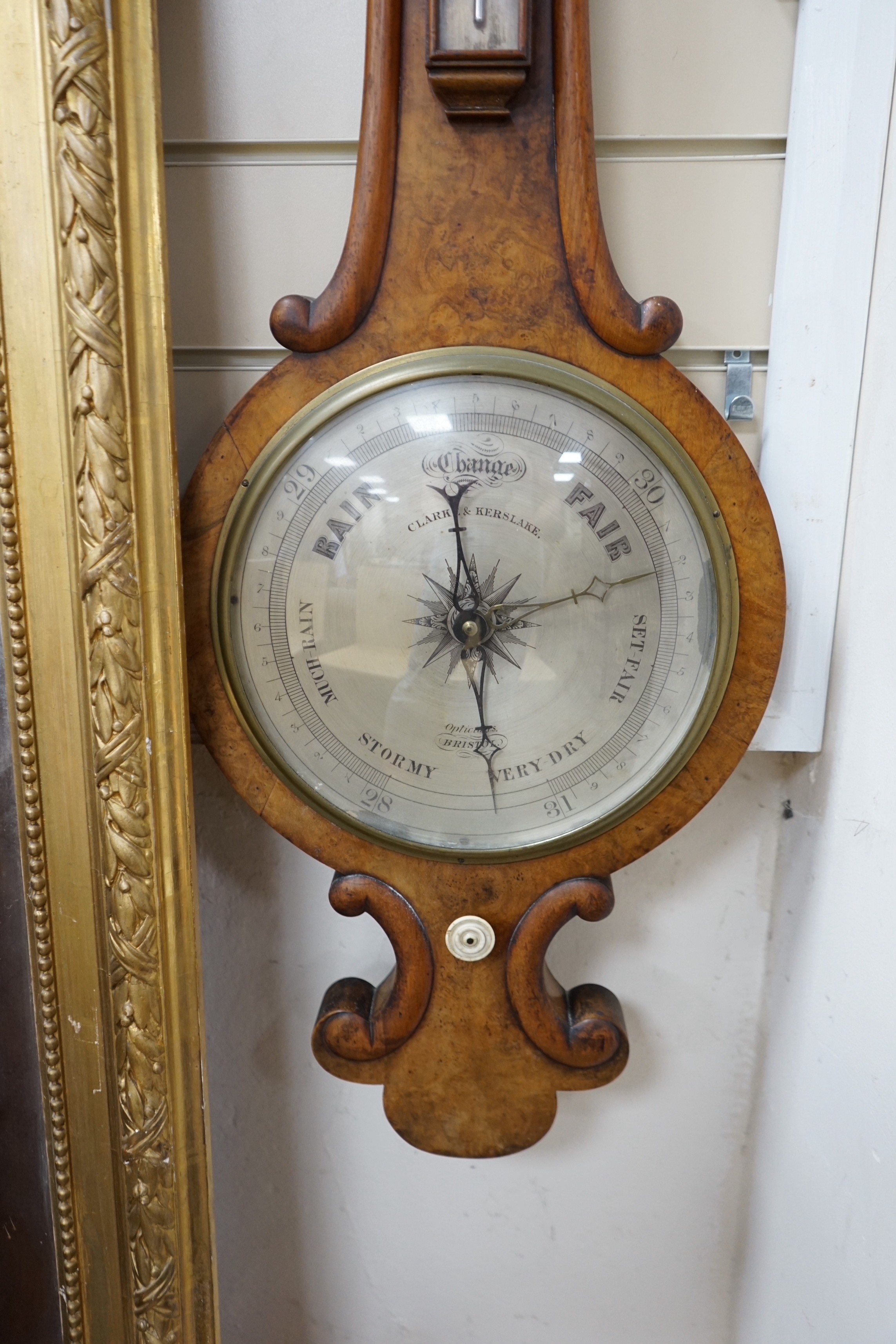A Victorian walnut wheel barometer, height 102cm